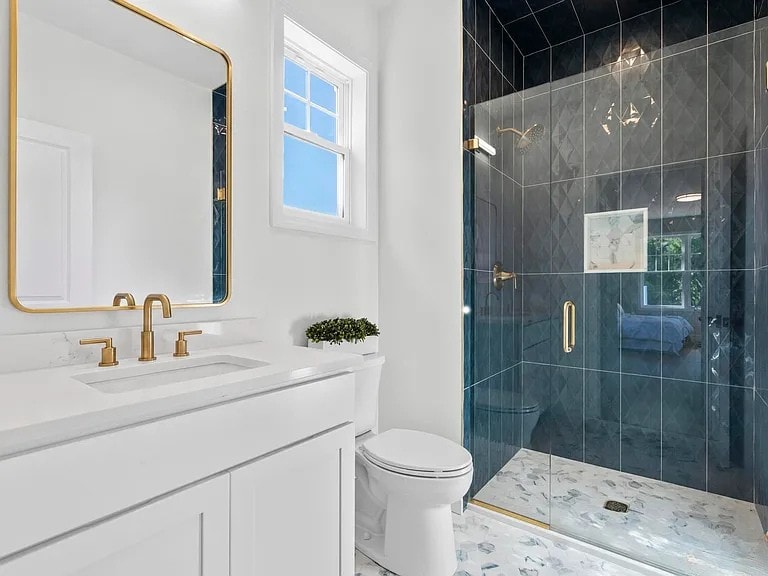 Full bathroom with soaking tub and tile floor